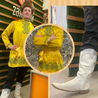 Рубаха , сапоги  — народный костюм.